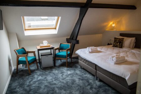 Comfortabele hotelkamer met airco bij GUZY Hotel Lier