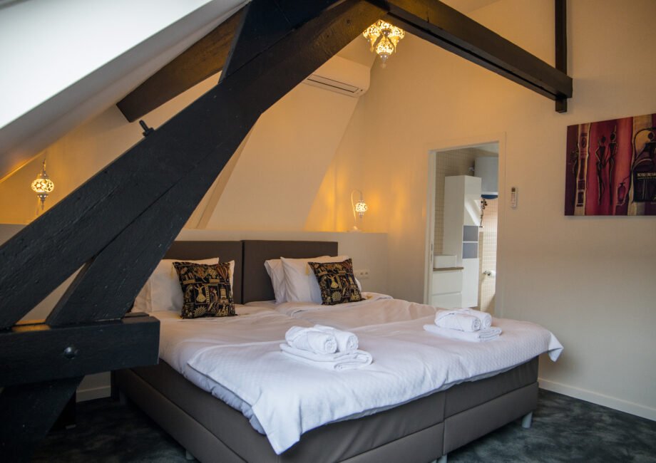 Comfortabele hotelkamer met airco bij GUZY Hotel Lier