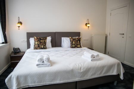 Comfortabele hotelkamer met airco bij GUZY Hotel Lier