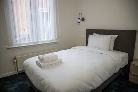 Comfortabele hotelkamer met airco bij GUZY Hotel Lier