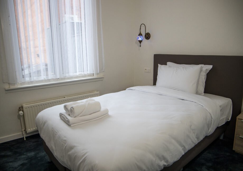 Comfortabele hotelkamer met airco bij GUZY Hotel Lier